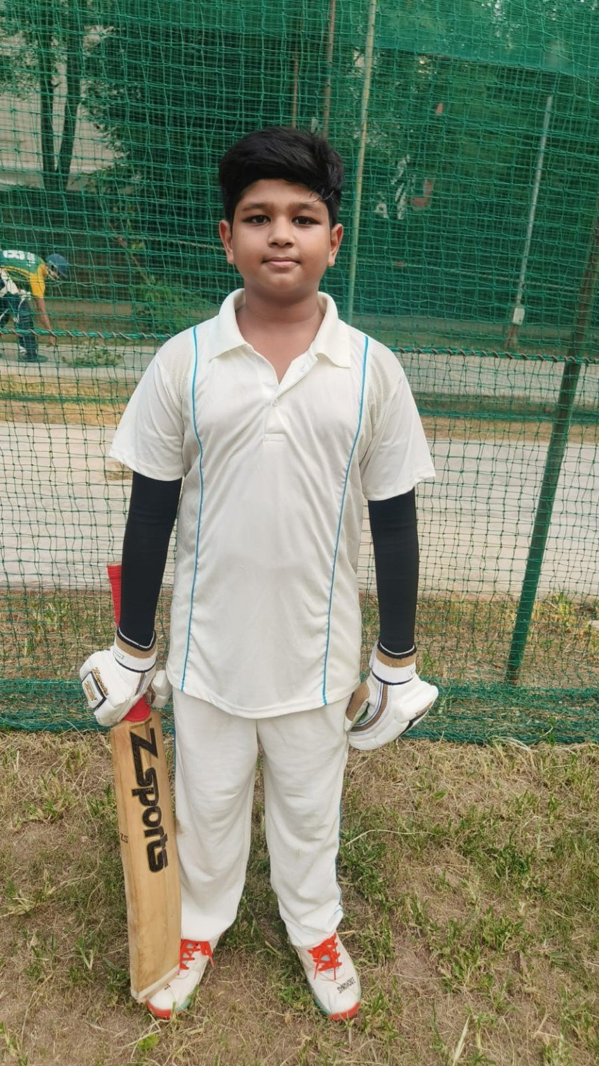 Young cricketer at the training nets